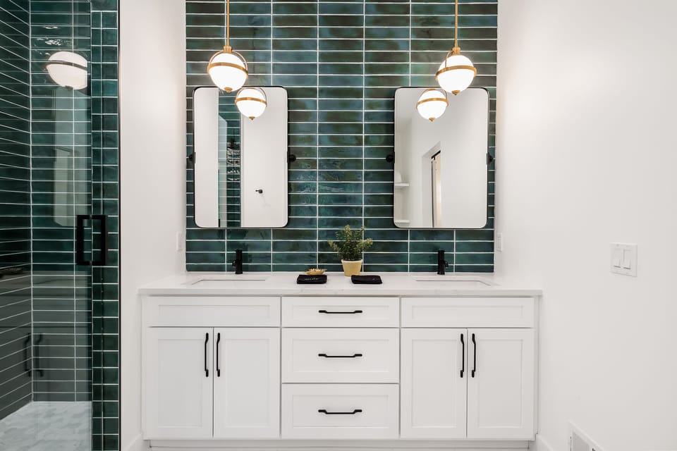 Step into your ensuite — double vanity, a walk-in shower, and spa finishes that make getting ready feel like a ritual.
