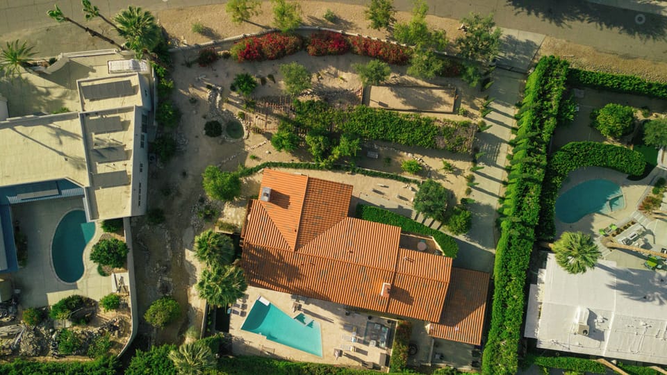 Aerial view of half acre property.