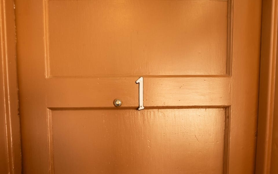 Step into your adventure at this charming door, ready for new memories!