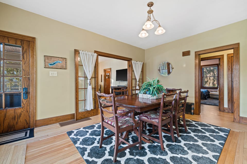 Dining room with natural lighting that connects to living room for entertaining.