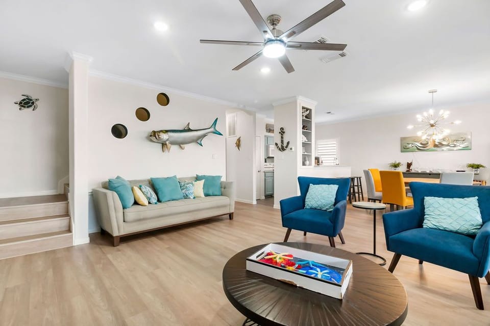 Beautiful, spacious living room with plenty of comfortable seating. 