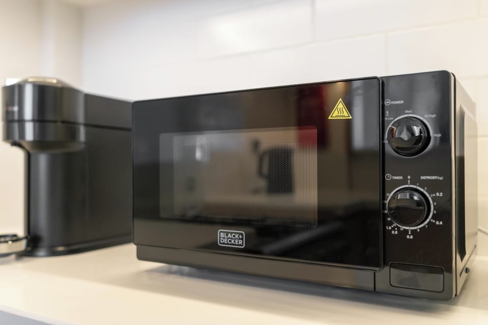 Panoramic Apartment | Private kitchen | Full-size fridge, microwave, oven, stovetop