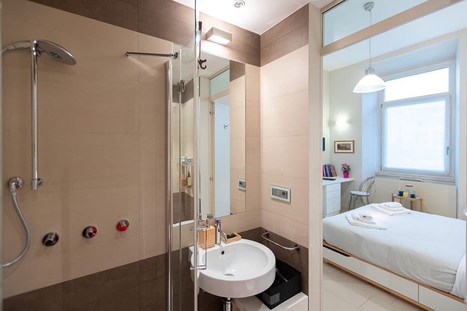 The bathroom comes with walk-in shower, toilet, bidet and sink