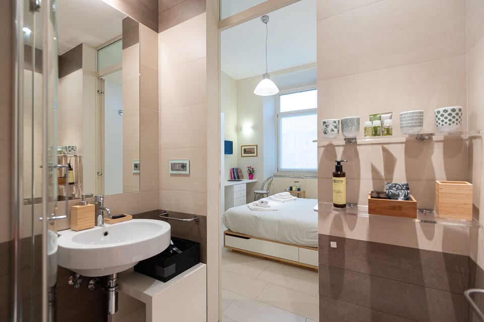 The bathroom comes with walk-in shower, toilet, bidet and sink