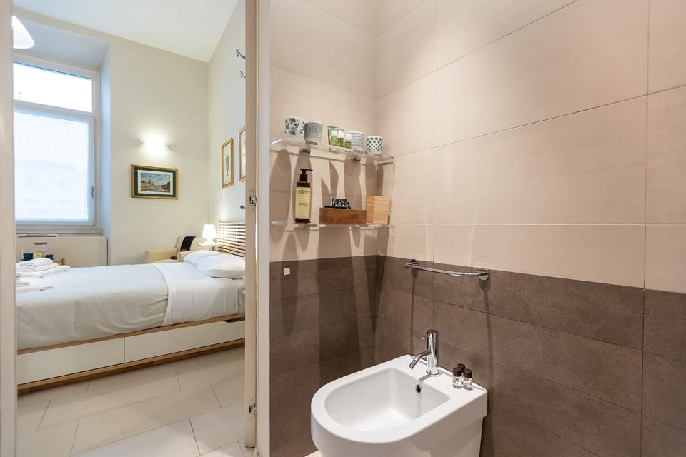 The bathroom comes with walk-in shower, toilet, bidet and sink