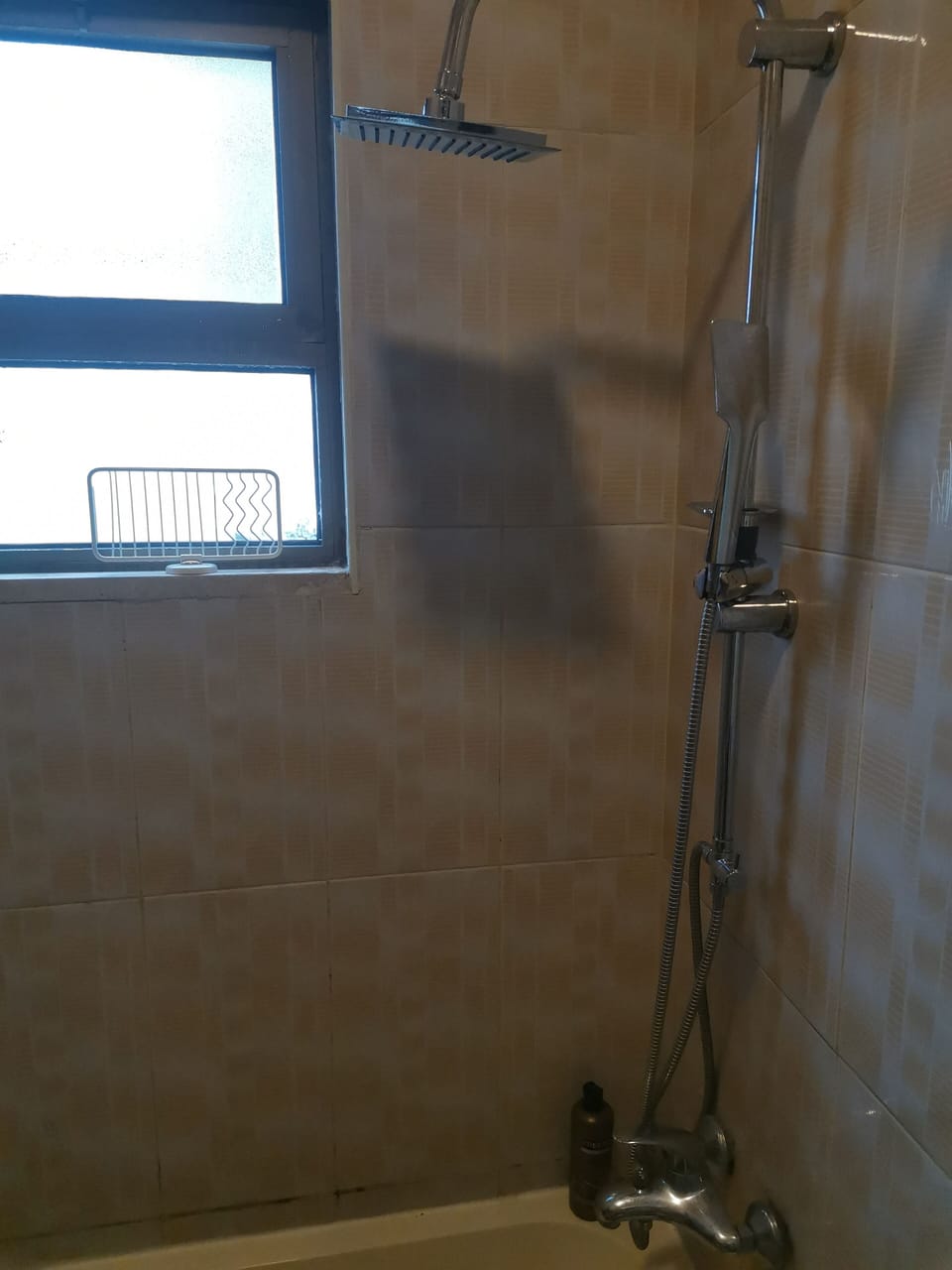 Comfort Room | Bathroom | Rainfall showerhead, towels, soap