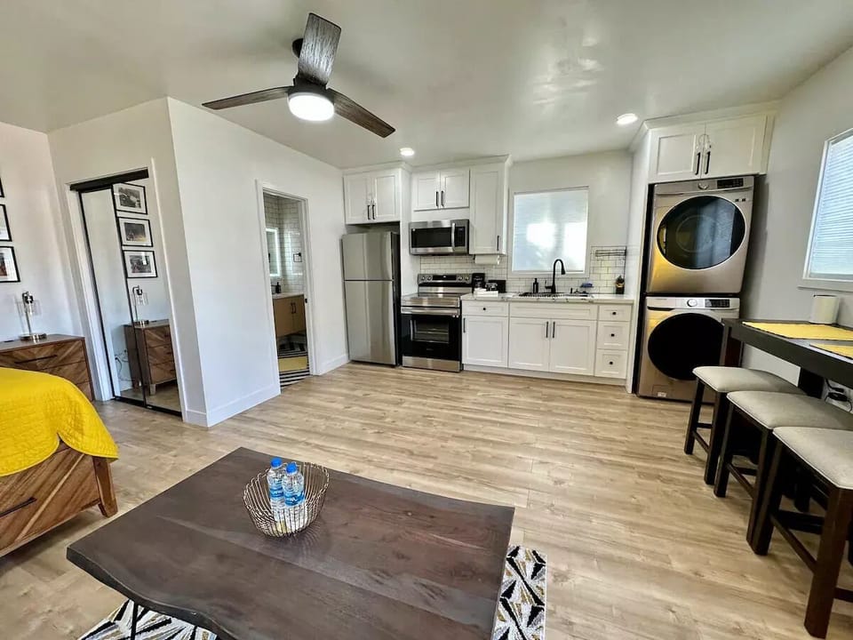Brand New full size washer & dryer. A beautiful wood dinning/working table.