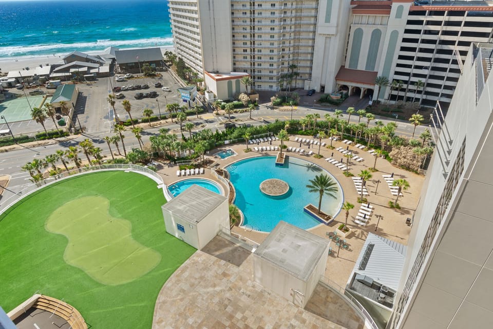 Main deck pool with onsite bar,  hot tub, snack bar & lounge