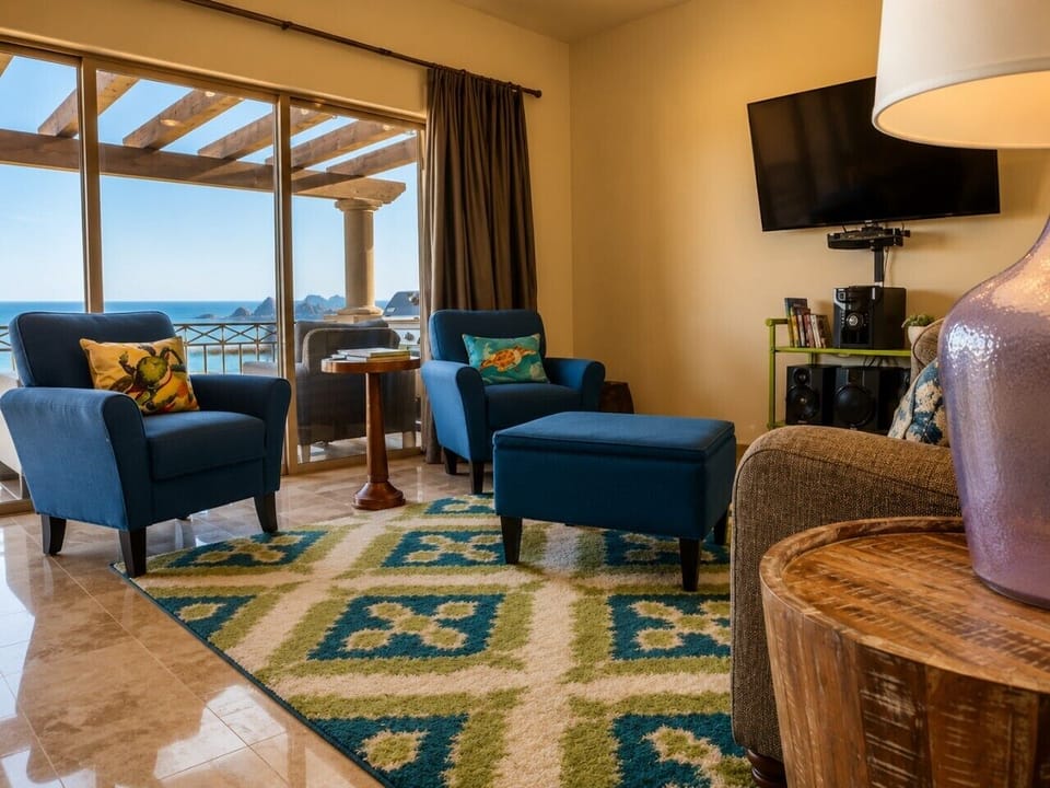 Bright and comfortable living room with panoramic ocean views.