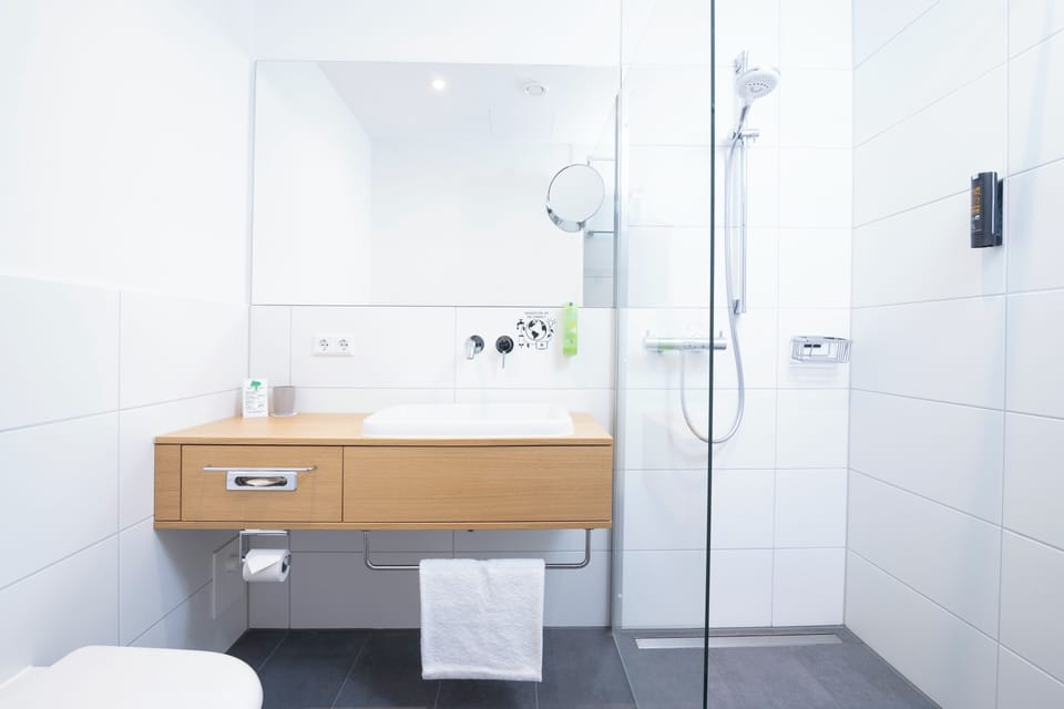 Shower, eco-friendly toiletries, hair dryer, heated floors