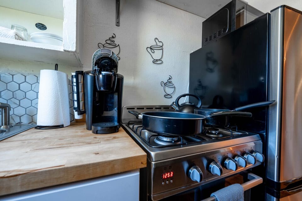 Cook up a storm with modern appliances and inviting decor just for you!