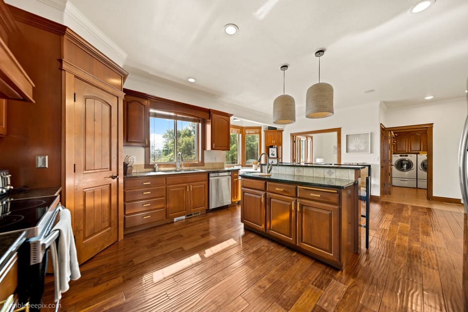 The kitchen is amazingly well stocked with many small appliances and cookware!