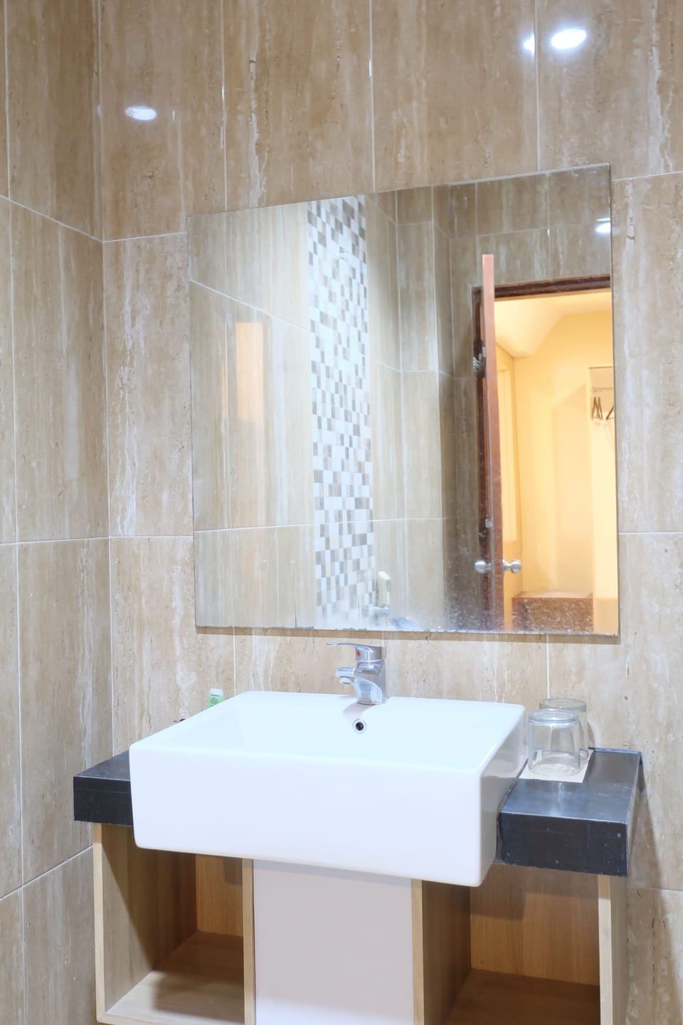 Shower, rainfall showerhead, hair dryer, towels