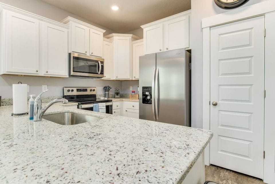 The island counter top space gives you extra room to spread out your favorite meals.