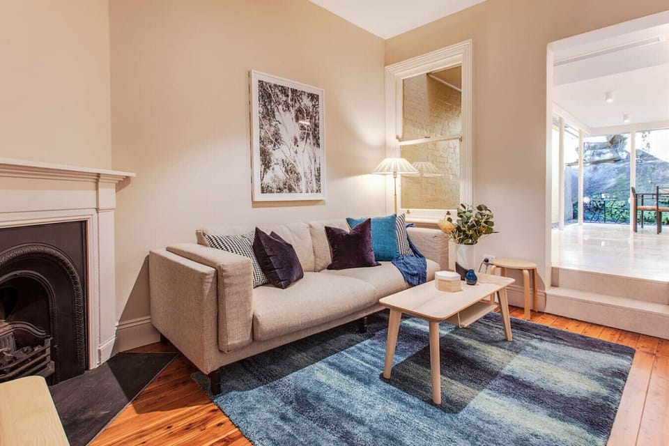 living room with sofa bed and tv