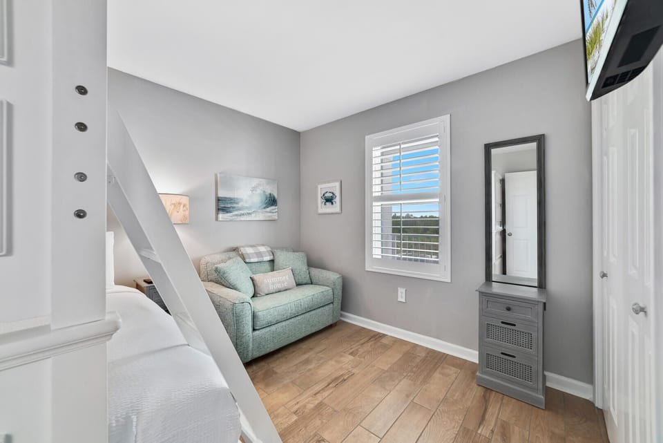 Modern and stylish decor complements the space with a cozy ambiance, blending comfort and aesthetics.
