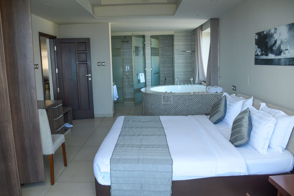 Grand Apartment | Living area | 32-inch Smart TV with cable channels, TV, Netflix