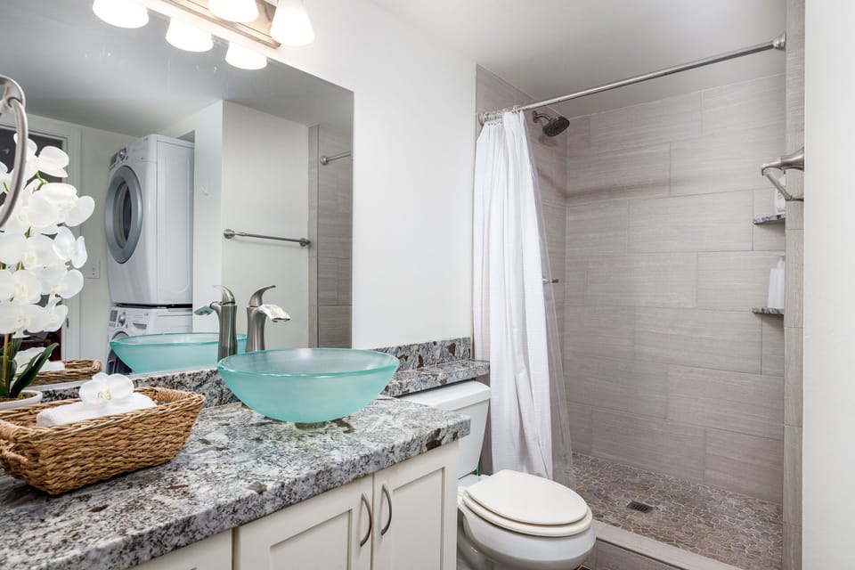 Bath has a walk in shower