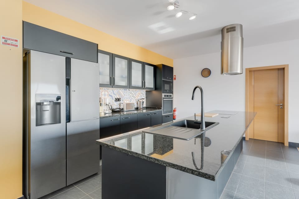 Luxury Villa | Private kitchen | Full-size fridge, microwave, oven, stovetop