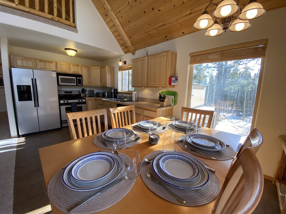 The dining table offers comfortable seating for 6
