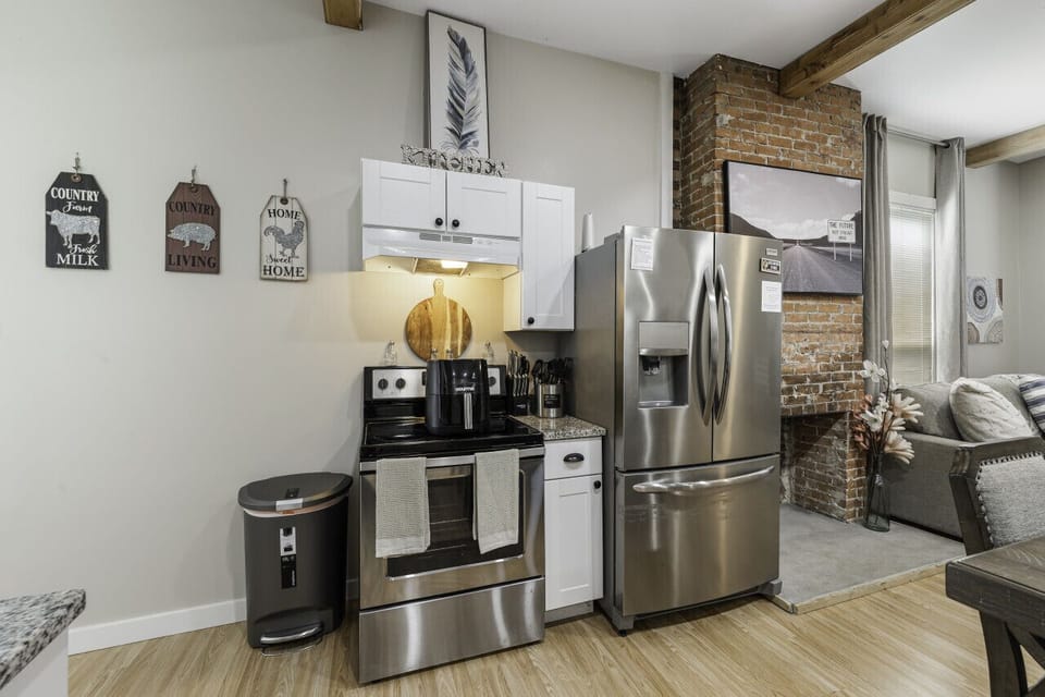 Experience serenity and comfort at our charming vacation home, boasting a spacious and modern full kitchen for all your culinary needs