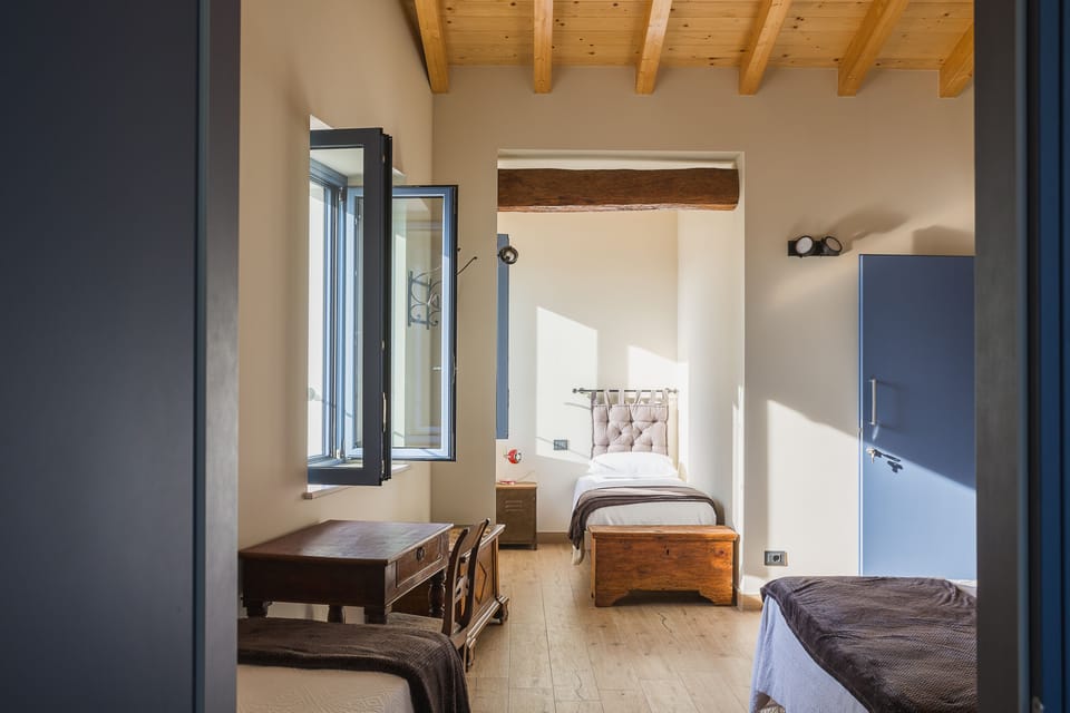 Luxury Quadruple Room | Hypo-allergenic bedding, down comforters, in-room safe, desk