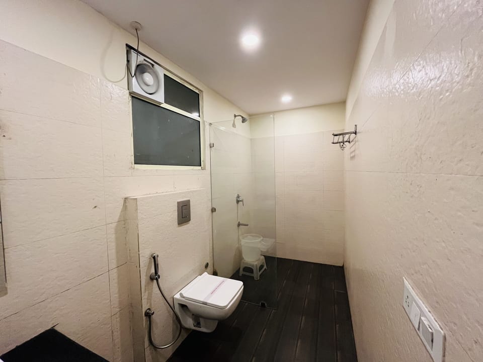 Shower, rainfall showerhead, towels, soap