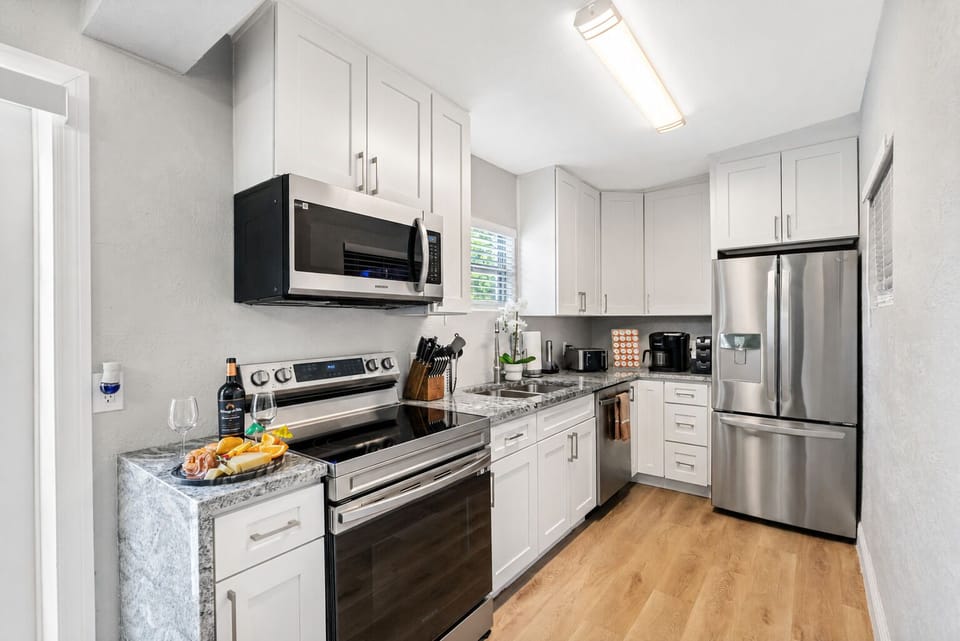 The countertops are made of high-quality materials and provide ample workspace for preparing meals.
