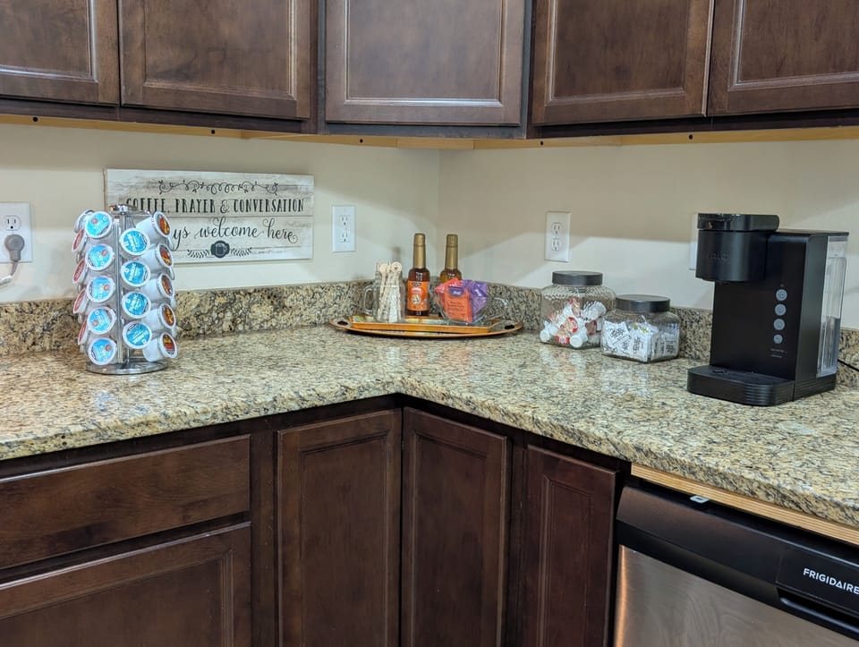 coffee, creamer, syrup,sugar packs, coffee stirrers 