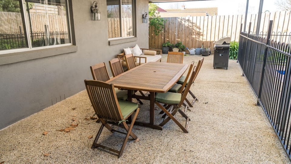 Undercover patio . Outdoor dining and gas barbecue