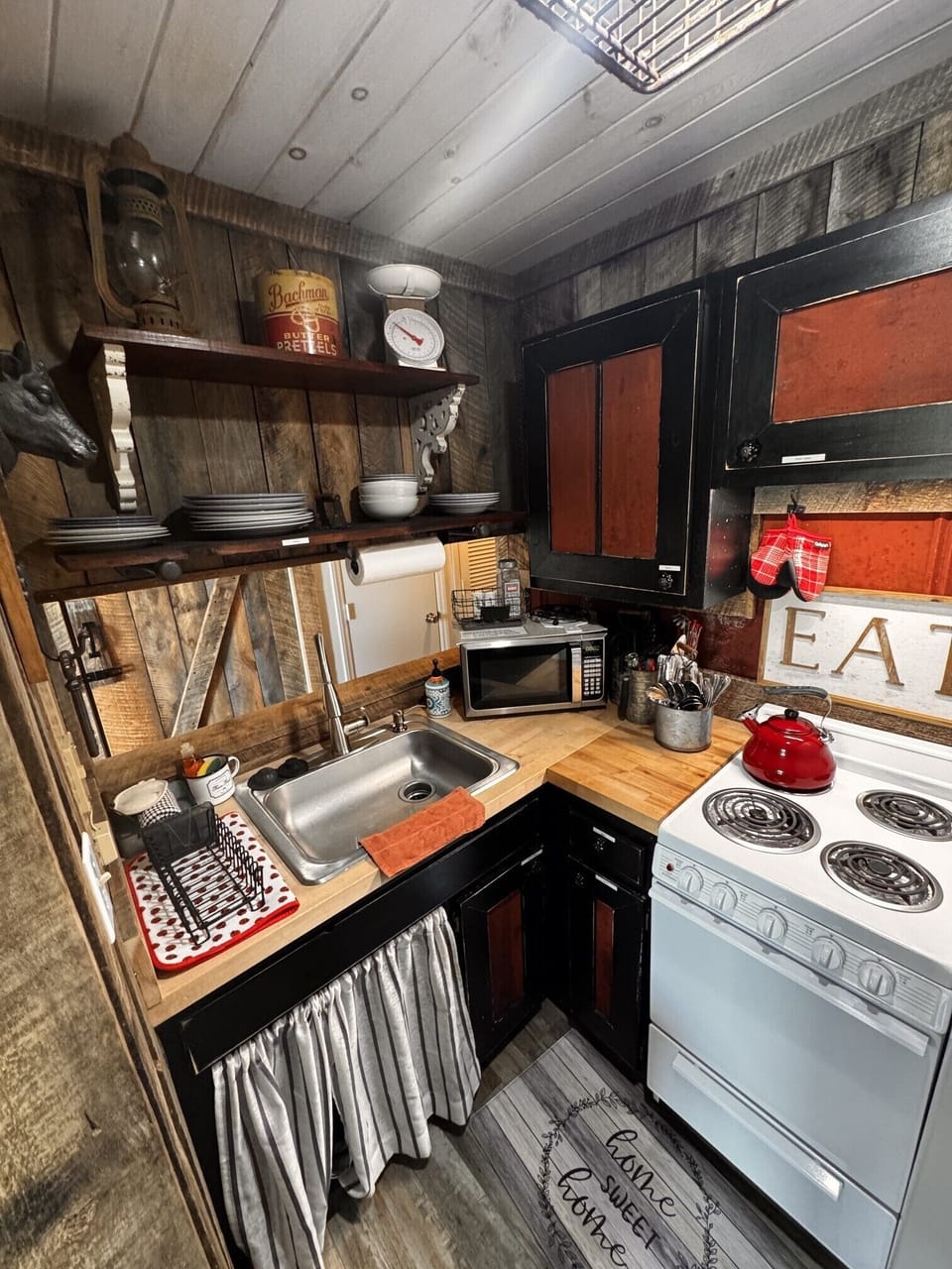 Cozy rustic kitchen with farmhouse charm and practical cooking space