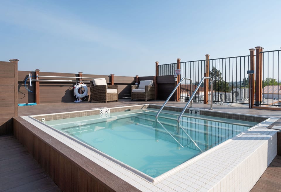 A full-sized Hot Tub, along with lounge seating for your enjoyment.