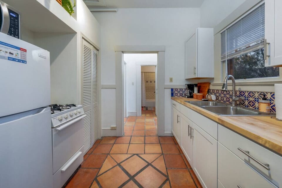 View of the kitchen, hall, and bathroom
