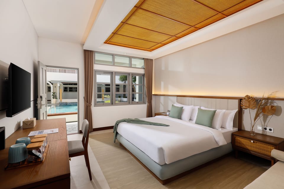 Deluxe Room, Ground Floor | Desk, laptop workspace, free cribs/infant beds, free WiFi