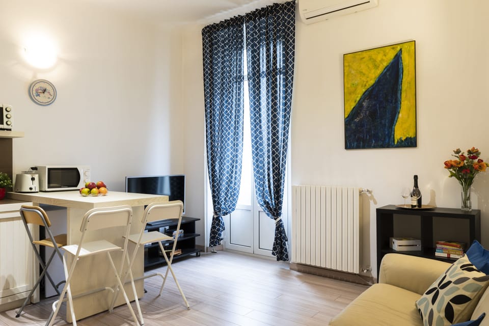 City Apartment | Living area | 32-inch flat-screen TV with digital channels, TV