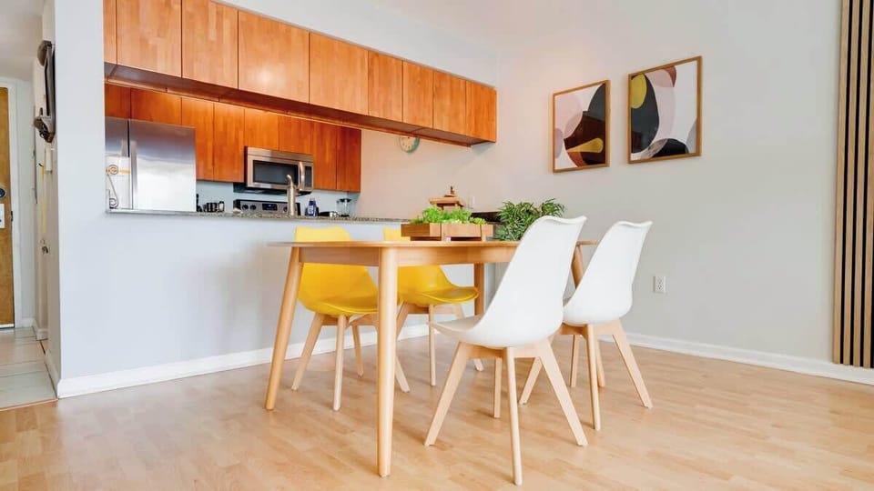 Modern open concept living space featuring dining area and kitchen