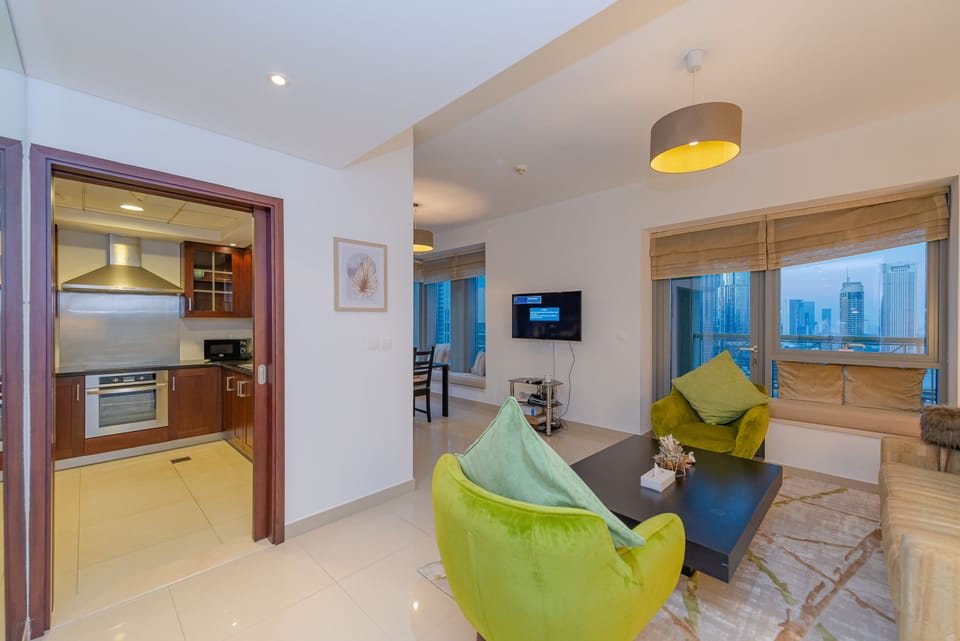 Design Apartment | Living area | 55-inch Smart TV with cable channels, TV