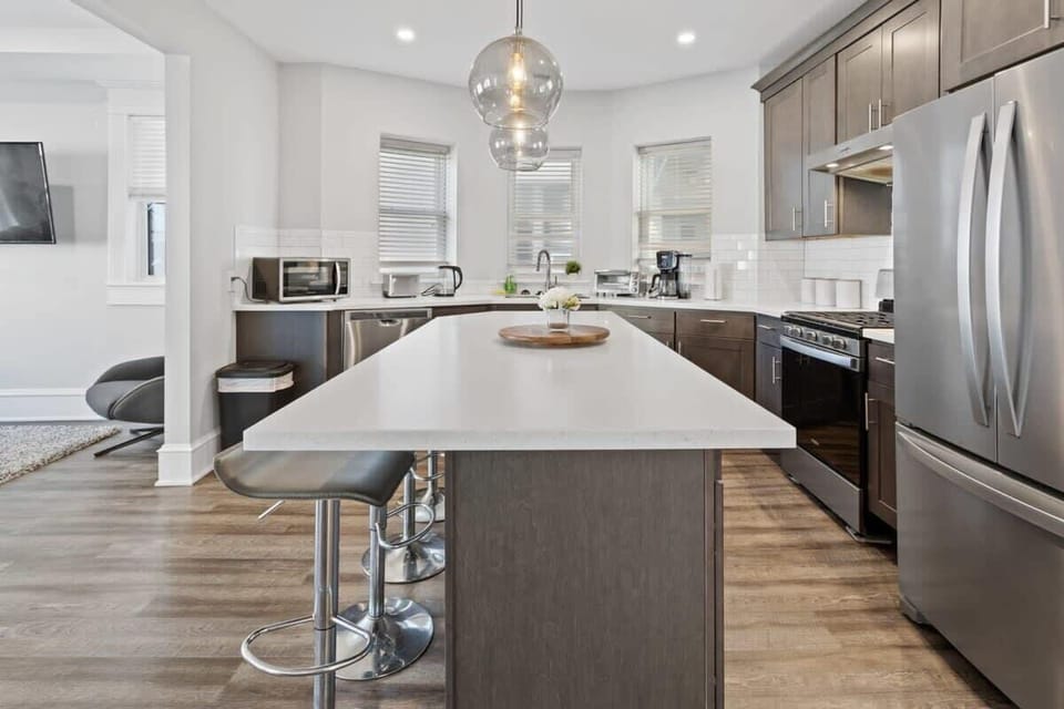 Spacious Island w/ Bar Stools in Each Kitchen