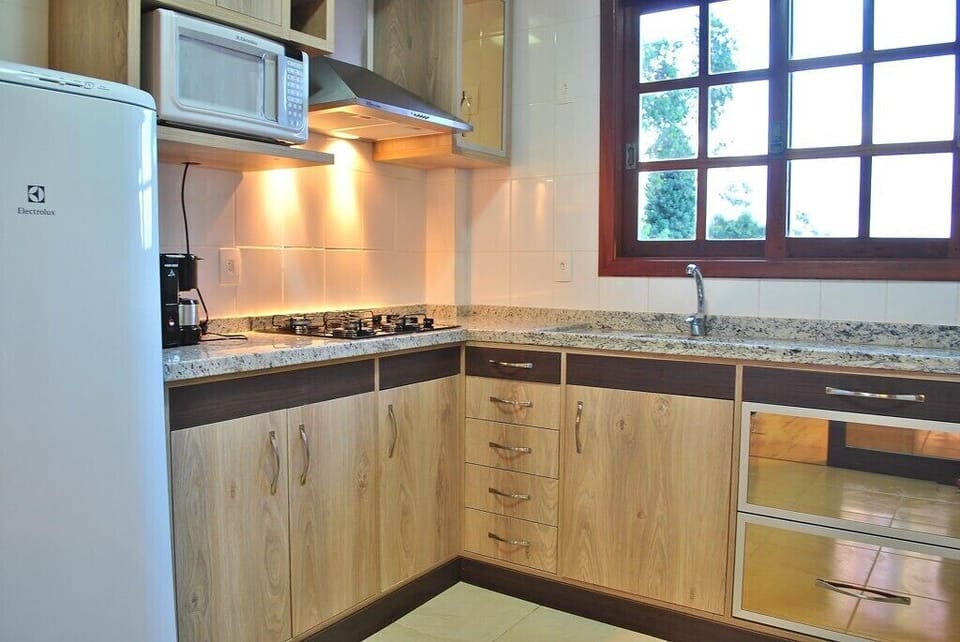 Fridge, microwave, cookware/dishes/utensils