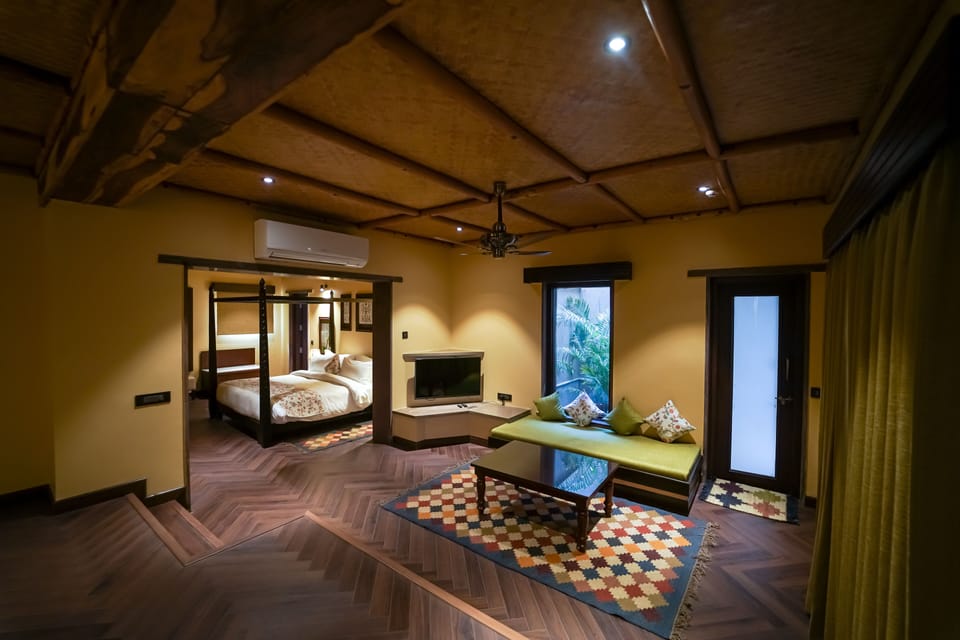Legacy Suite with King Bed | Living area | 42-inch LED TV with digital channels, TV