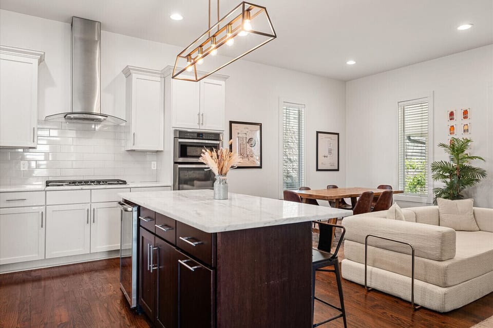 Kitchen, dining, and living all in one open space — great for groups who want to stay connected whether cooking, eating, or relaxing.