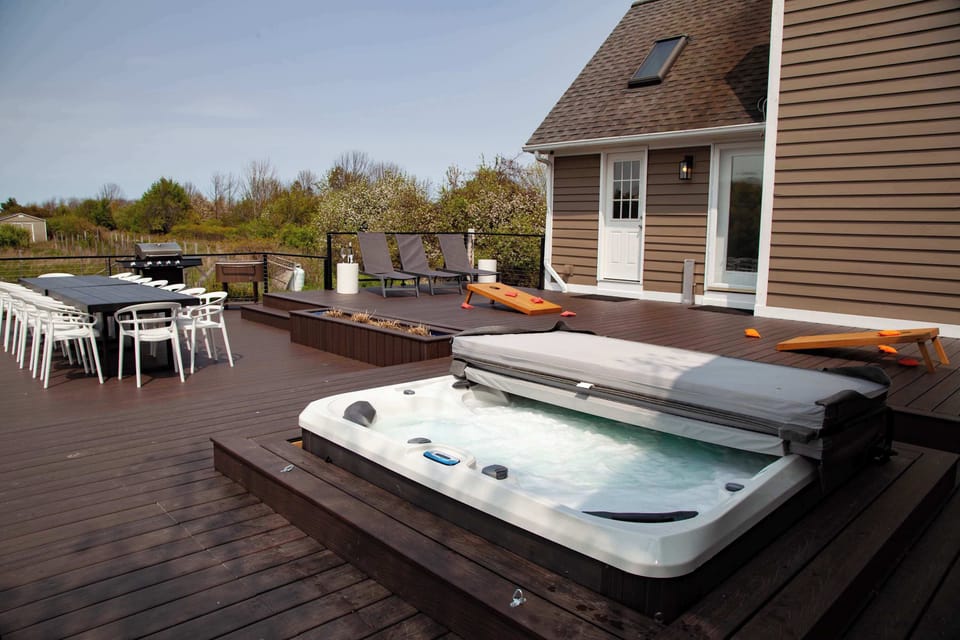 Unwind in the private hot tub and take in the peaceful surroundings.