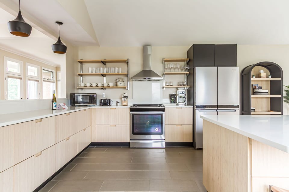 Bright kitchen with beautiful views of the lake while you cook.
