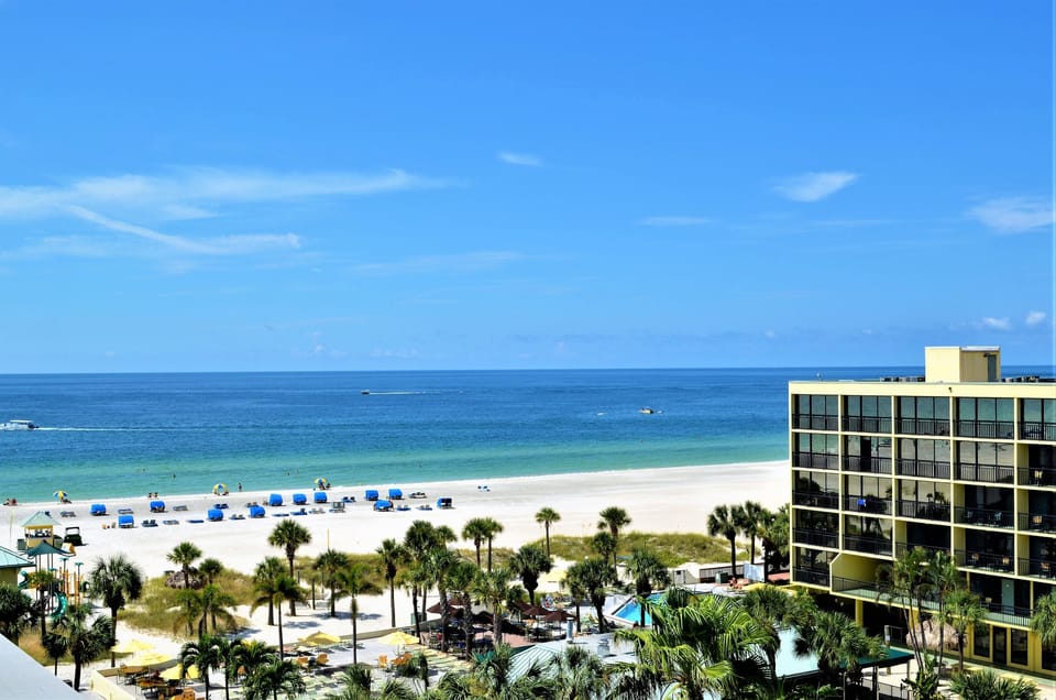 On the beach, beach cabanas, beach volleyball, 2 beach bars