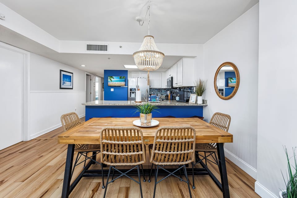 The dining area offers a large table ideal for playing board games.