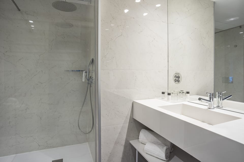 Shower, free toiletries, hair dryer, towels