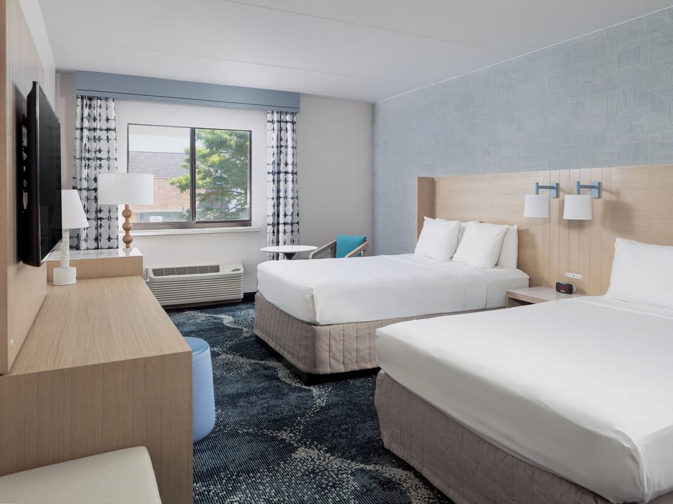 Hypo-allergenic bedding available, desk, laptop workspace
