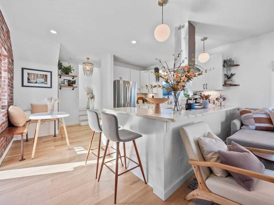 Walk into a beautiful open concept space that is perfect for conversations, cooking and coffee:)