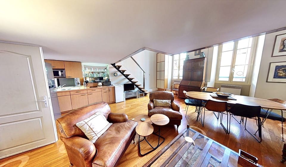 Two large double glazed windows open up the light for this high vaulted ceiling