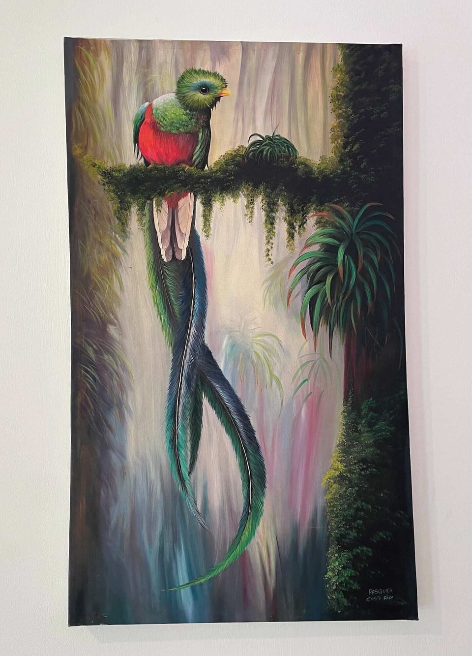 Artwork of a quetzal - the home's namesake.